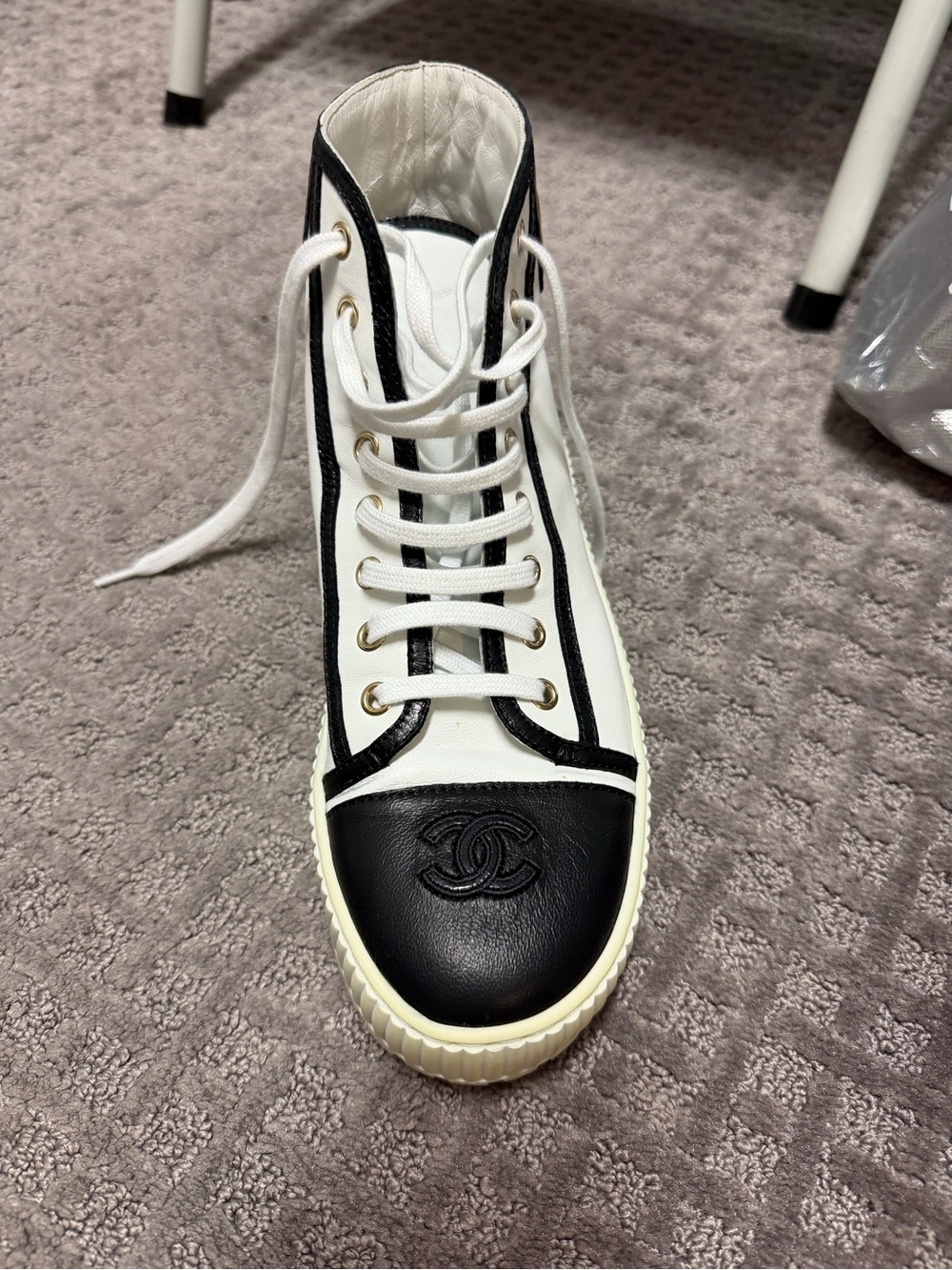 CHANEL White and Black High-Top Logo Sneaker